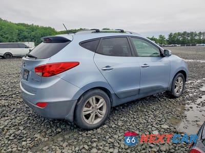 Trzecie zdjęcie samochodu z tyłu: 2012 HYUNDAI TUCSON GLS VIN:KM8JUCAC9CU417063 - miniatura