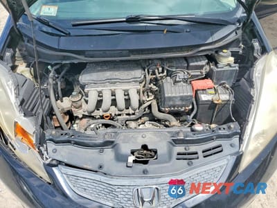 Zdjęcie 11 z 12 samochodu: 2009 HONDA FIT SPORT VIN:JHMGE88489S057293 - miniatura