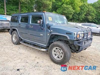 Czwarte zdjęcie samochodu z boku: 2006 HUMMER H2 VIN:5GRGN23U46H105482 - miniatura
