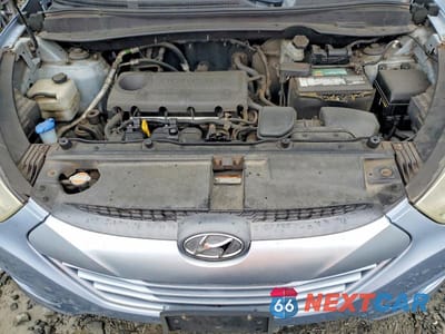 Zdjęcie 12 z 13 samochodu: 2012 HYUNDAI TUCSON GLS VIN:KM8JUCAC9CU417063 - miniatura
