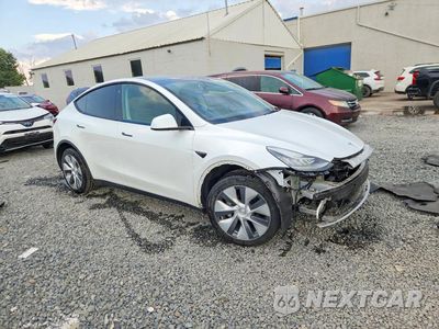Czwarte zdjęcie samochodu z boku: 2023 TESLA MODEL Y VIN:7SAYGDEE7PA058757 - miniatura