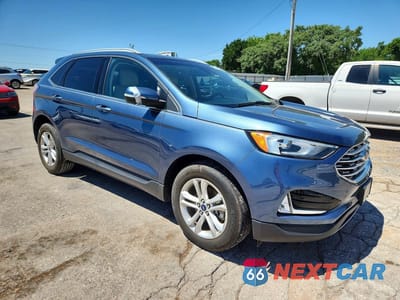 Czwarte zdjęcie samochodu z boku: 2019 FORD EDGE SEL VIN:2FMPK3J97KBC61937 - miniatura