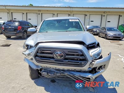 Piąte zdjęcie samochodu w środku: 2019 TOYOTA TACOMA SR VIN:5TFAX5GN5KX137864 - miniatura