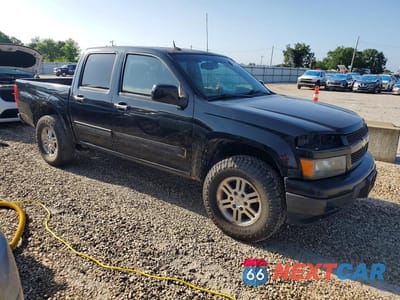 Czwarte zdjęcie samochodu z boku: 2011 CHEVROLET COLORADO LT VIN:1GCHTCFE4B8112030 - miniatura