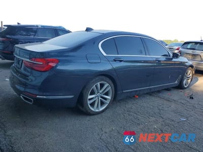 Trzecie zdjęcie samochodu z tyłu: 2016 BMW 750 I VIN:WBA7F0C51GGL99651 - miniatura