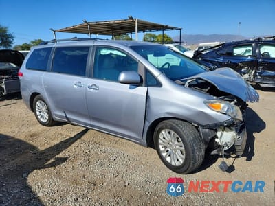 Czwarte zdjęcie samochodu z boku: 2011 TOYOTA SIENNA XLE 8-PASSENGER VIN:5TDYK3DC5BS088255 - miniatura