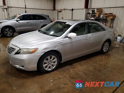 2007 TOYOTA CAMRY HYBRID JTNBB46K973038690 - główne zdjęcie licytacji z USA - miniatura