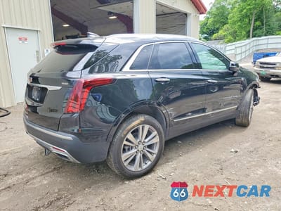 Trzecie zdjęcie samochodu z tyłu: 2024 CADILLAC XT5 PREMIUM LUXURY VIN:1GYKNDRS6RZ719309 - miniatura