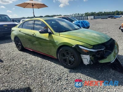 Czwarte zdjęcie samochodu z boku: 2024 HYUNDAI ELANTRA N LINE VIN:KMHLR4DF8RU765841 - miniatura