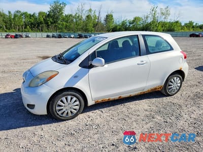 2009 TOYOTA YARIS BASE JTDJT903295263407 - główne zdjęcie licytacji z USA - miniatura