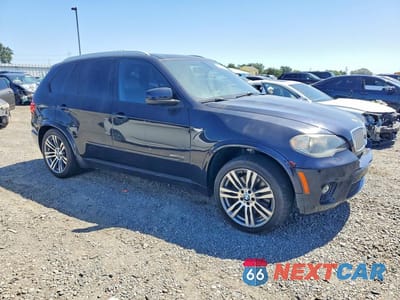 Czwarte zdjęcie samochodu z boku: 2011 BMW X5 XDRIVE50I VIN:5UXZV8C54BL417300 - miniatura