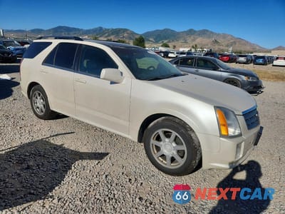 Czwarte zdjęcie samochodu z boku: 2005 CADILLAC SRX VIN:1GYEE63A250157318 - miniatura