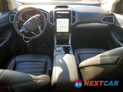 Zdjęcie 8 z 13 samochodu: 2021 FORD EDGE SEL VIN:2FMPK4J98MBA11048 - miniatura