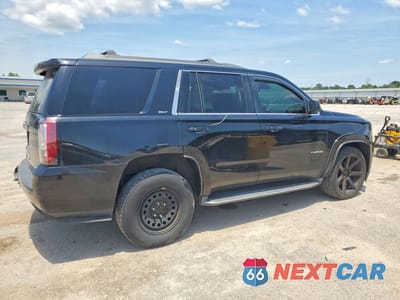 Trzecie zdjęcie samochodu z tyłu: 2016 GMC YUKON SLT VIN:1GKS1BKC6GR143991 - miniatura
