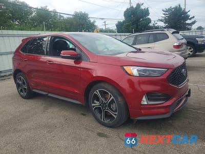 Czwarte zdjęcie samochodu z boku: 2019 FORD EDGE ST VIN:2FMPK4AP6KBB28171 - miniatura