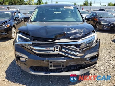 Piąte zdjęcie samochodu w środku: 2017 HONDA PILOT EXL VIN:5FNYF6H57HB003382 - miniatura