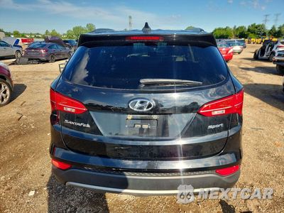 Zdjęcie 6 z 12 samochodu: 2014 HYUNDAI SANTA FE SPORT 2.4L VIN:5XYZU3LB9EG174449 - miniatura