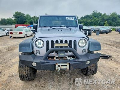 Piąte zdjęcie samochodu w środku: 2014 JEEP WRANGLER UNLIMITED SPORT VIN:1C4BJWDG6EL171650 - miniatura
