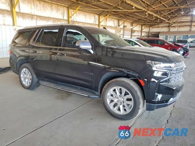 Czwarte zdjęcie samochodu z boku: 2023 CHEVROLET TAHOE K1500 PREMIER VIN:1GNSKSKD7PR304163 - miniatura