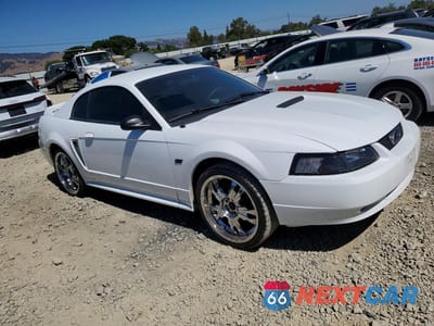 Czwarte zdjęcie samochodu z boku: 2000 FORD MUSTANG GT VIN:1FAFP42X9YF123835 - miniatura