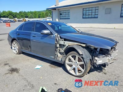 Czwarte zdjęcie samochodu z boku: 2017 MERCEDES-BENZ E 300 4MATIC VIN:WDDZF4KB6HA132039 - miniatura