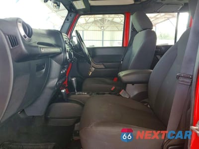 Zdjęcie 7 z 12 samochodu: 2016 JEEP WRANGLER UNLIMITED SPORT VIN:1C4BJWKG6GL107534 - miniatura