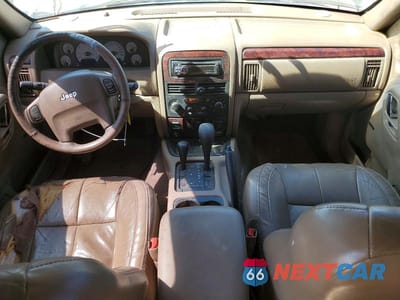 Zdjęcie 8 z 13 samochodu: 2001 JEEP GRAND CHEROKEE LIMITED VIN:1J4GW58N81C680959 - miniatura