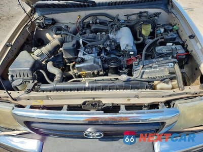 Zdjęcie 11 z 12 samochodu: 2000 TOYOTA TACOMA BASE VIN:4TAPM62N1YZ588492 - miniatura