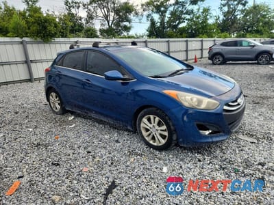 Czwarte zdjęcie samochodu z boku: 2014 HYUNDAI ELANTRA GT BASE VIN:KMHD35LH6EU225672 - miniatura
