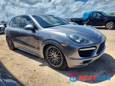 Czwarte zdjęcie samochodu z boku: 2013 PORSCHE CAYENNE GTS VIN:WP1AD2A20DLA71805 - miniatura