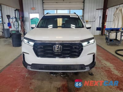 Piąte zdjęcie samochodu w środku: 2024 HONDA PILOT TOURING VIN:5FNYG1H77RB000047 - miniatura
