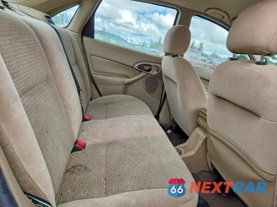 Zdjęcie 10 z 12 samochodu: 2003 FORD FOCUS SE COMFORT VIN:1FAFP34363W113907 - miniatura