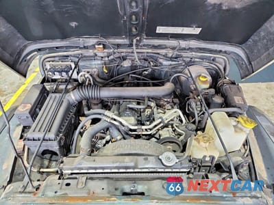 Zdjęcie 11 z 12 samochodu: 2002 JEEP WRANGLER / TJ X VIN:1J4FA39S72P708845 - miniatura
