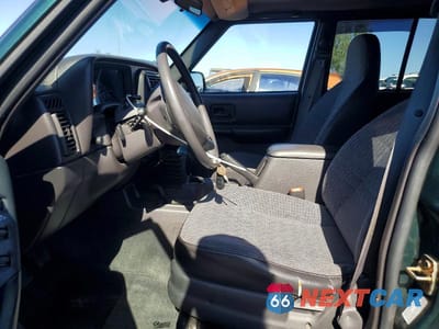 Zdjęcie 7 z 13 samochodu: 2000 JEEP CHEROKEE SPORT VIN:1J4FF48S9YL268300 - miniatura