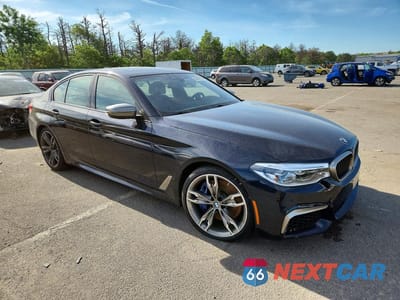 Czwarte zdjęcie samochodu z boku: 2020 BMW M550XI VIN:WBAJS7C05LBN96618 - miniatura