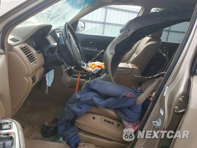 Zdjęcie 7 z 13 samochodu: 2004 HONDA PILOT EXL VIN:2HKYF186X4H586568 - miniatura