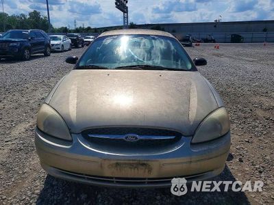 Piąte zdjęcie samochodu w środku: 2000 FORD TAURUS LX VIN:1FAFP5221YG248543 - miniatura