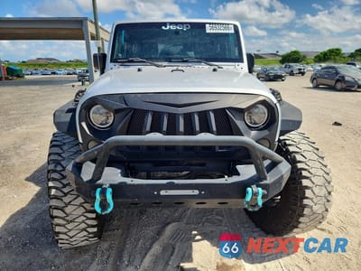 Piąte zdjęcie samochodu w środku: 2008 JEEP WRANGLER SAHARA VIN:1J4FA54108L643749 - miniatura