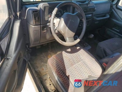 Zdjęcie 8 z 13 samochodu: 2000 JEEP WRANGLER / TJ SPORT VIN:1J4FA49S0YP707891 - miniatura
