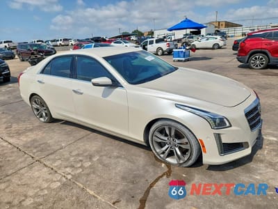 Czwarte zdjęcie samochodu z boku: 2014 CADILLAC CTS VSPORT VIN:1G6AU5S82E0148640 - miniatura