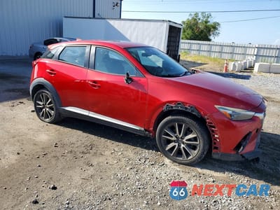 Czwarte zdjęcie samochodu z boku: 2016 MAZDA CX-3 GRAND TOURING VIN:JM1DKBD79G0105175 - miniatura