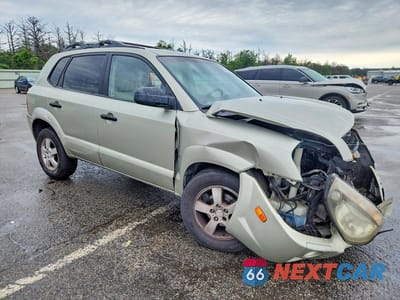 Czwarte zdjęcie samochodu z boku: 2006 HYUNDAI TUCSON GL VIN:KM8JM12B26U435905 - miniatura