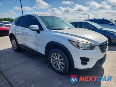 Czwarte zdjęcie samochodu z boku: 2016 MAZDA CX-5 SPORT VIN:JM3KE2BY7G0711320 - miniatura