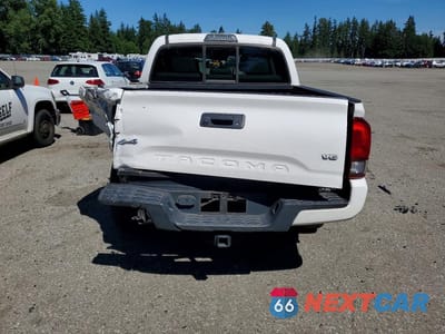 Zdjęcie 6 z 12 samochodu: 2018 TOYOTA TACOMA SR V6 VIN:3TMCZ5AN5JM187728 - miniatura