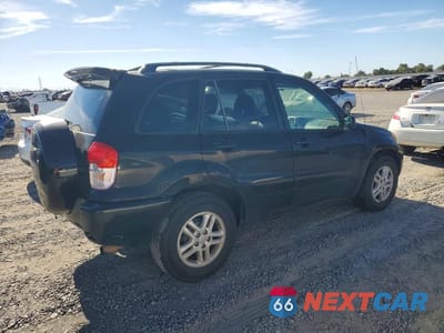 Trzecie zdjęcie samochodu z tyłu: 2002 TOYOTA RAV4 BASE VIN:JTEGH20V026000803 - miniatura