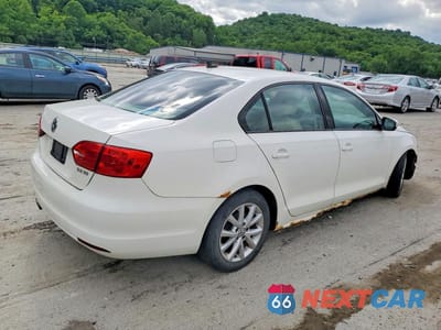 Trzecie zdjęcie samochodu z tyłu: 2011 VOLKSWAGEN JETTA SE VIN:3VWDZ7AJ4BM354656 - miniatura