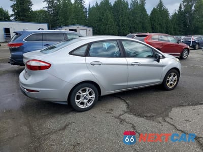Trzecie zdjęcie samochodu z tyłu: 2015 FORD FIESTA SE VIN:3FADP4BJ7FM196007 - miniatura