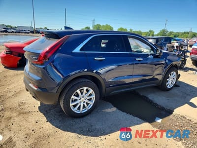 Trzecie zdjęcie samochodu z tyłu: 2022 CADILLAC XT4 LUXURY VIN:1GYAZAR49NF137944 - miniatura