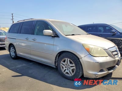 Czwarte zdjęcie samochodu z boku: 2006 HONDA ODYSSEY EXL VIN:5FNRL38776B027174 - miniatura