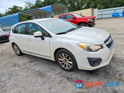 Czwarte zdjęcie samochodu z boku: 2012 SUBARU IMPREZA PREMIUM VIN:JF1GPAB6XCH243926 - miniatura